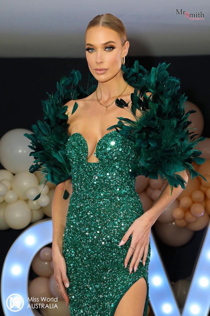 Miss World Australia in emerald gown with feathered shoulders