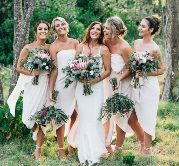 Richelle Darben applying makeup to a bride